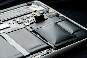 
close up of Technician repairing electronic circuit board, repairing deteriorated battery, upgrade...