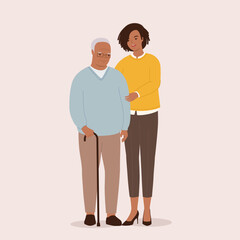 Smiling Black Adult Woman Holding Arm Of A Senior Man With Walking Cane. Full Length.