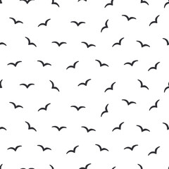 Seamless bird silhouette pattern. Vector illustration of cartoon seagulls, background with birds.