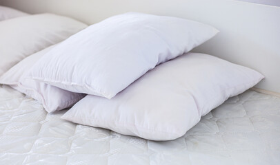 White pillows placed on the bed