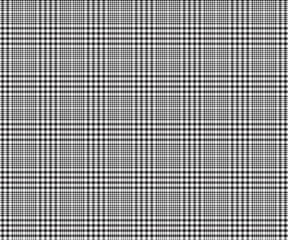 Plaid fabric pattern, white, black, seamless pattern for textiles, and for designing modern striking clothing, skirts, pants or decorative fabrics. Vector illustration.