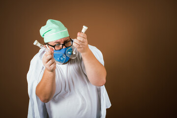 Healthy lifestyle. Funny fat man in a doctor's suit on a brown background.