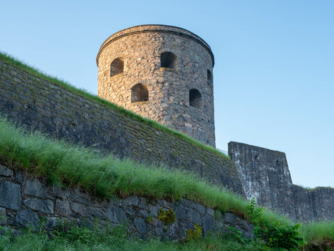 Stone tower of bohus fortress in Sweden in early morning light
