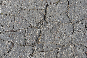 Cracked asphalt road detail