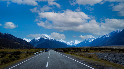 The road way  travel with mountain landscape view of blue sky background over Aoraki mount cook national park,New zealand