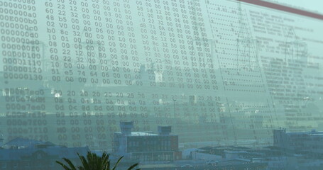 Image of data processing against aerial view of cityscape