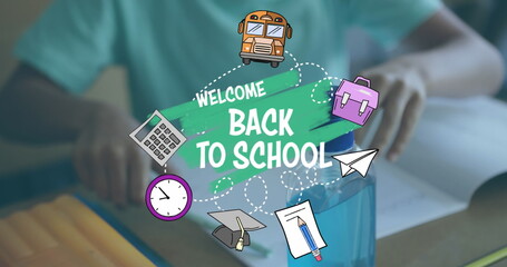 Image of welcome back to school text and school icons over biracial schoolboy