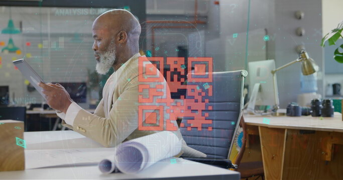 Image of qr code and data processing over african american businessman using tablet - Powered by Adobe