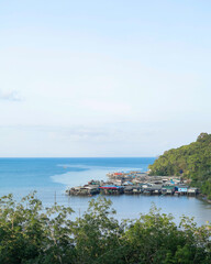 Landscape of a fishing village on an island in Thailand with a bountiful sea.