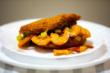 Traditional Brazilian acarajé, food of African origin based on vatapá, caruru and dry shrimp 