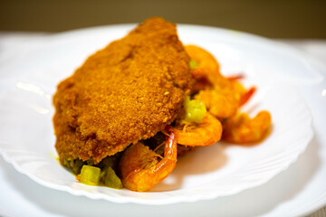 Traditional Brazilian acarajé, food of African origin based on vatapá, caruru and dry shrimp 
