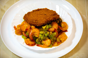Traditional Brazilian acarajé, food of African origin based on vatapá, caruru and dry shrimp 