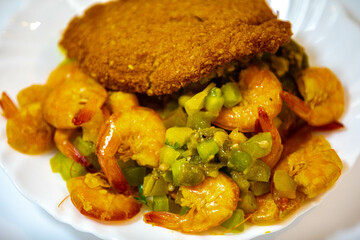Traditional Brazilian acarajé, food of African origin based on vatapá, caruru and dry shrimp 