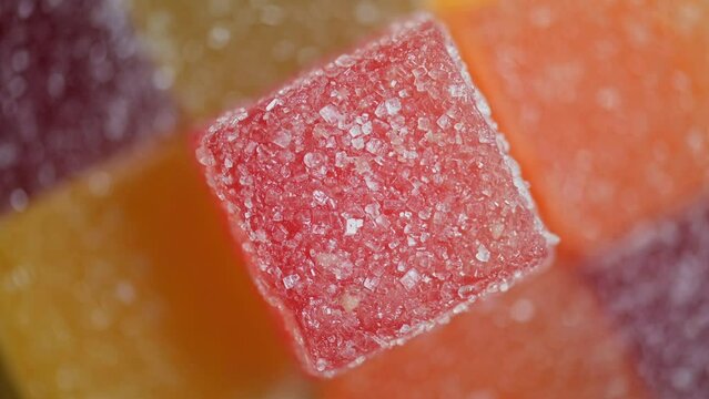 Assorted jelly candies extreme close up with rotation.