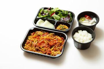 Take-out lunch box, spicy stir-fried meat and side dishes