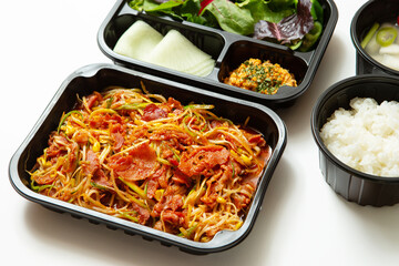Take-out lunch box, spicy stir-fried meat and side dishes
