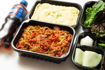 Take-out lunch box, spicy stir-fried meat and side dishes	
