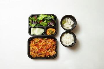 Take-out lunch box, spicy stir-fried meat and side dishes	