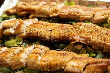 eels split and broiled[grilled] in soy, broiled eels