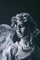 A detailed view of an angel statue with intricate features and ornate details