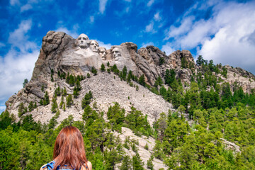 Back view of a woman visiting Mt Rushmore, South Dakota