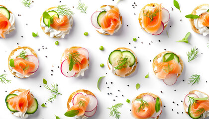 Tasty canapes with salmon, cucumber, radish and cream cheese isolated on white, top view