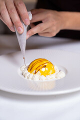 Culinary Art: Chef Decorating a Gourmet Dessert