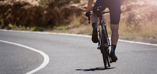 Road bike cyclist man cycling, athlete on a race cycle	