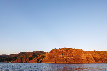 漁船に乗って、中木沖の太平洋へサンセットクルージングに出航。
沖から眺める、夕焼けの中木港。

日本国静岡県伊豆半島賀茂郡南伊豆町中木から渡し船で渡るヒリゾ浜にて。
2022年10月撮影。
