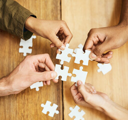 Puzzle, building and hands of business people for teamwork, collaboration and working together....