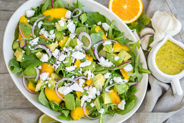 Fresh mango salad with tropical, zesty fruit dressing