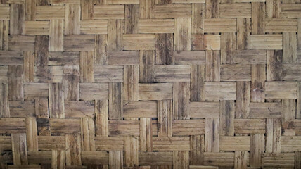 Close-Up of Woven Bamboo Pattern with Natural Brown Tones for Textured Background