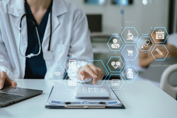 Fototapeta premium Doctor working in hospital use calculator, Healthcare and medical concept.