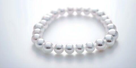 White Pearl Necklace on a White Background. Concept Jewelry, White Background, Pearl Necklace