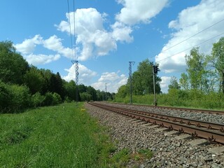Two way railroad tracks in countryside. Two railway tracks. Sunny day. Countryside. Fields and...