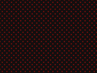 a black background with red polka dot pattern