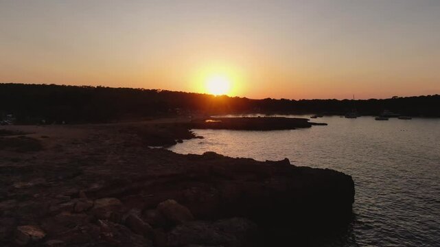 Sunset in Cala Bassa Ibiza with Drone