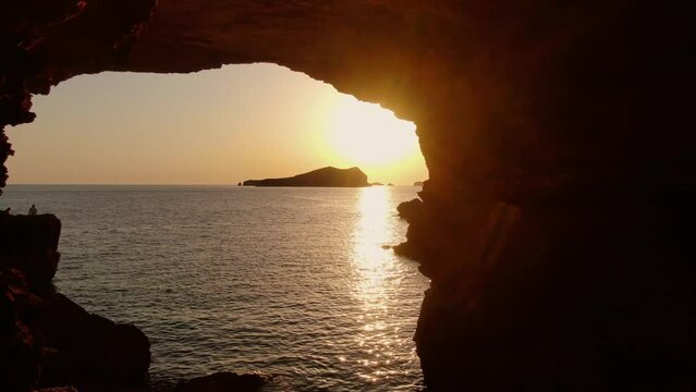 Sunset in Sa Figuera Borda Cave Ibiza with drone
