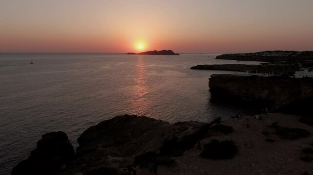 Sunset in Cala Tarida Ibiza with drone