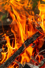 Close-up of blazing flames, wood that is burning.