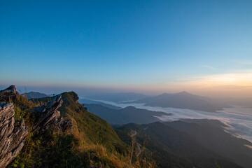 Naklejka premium On the top of the mountain in the morning with beautiful mist.