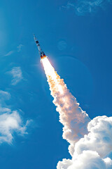 Russian Rocket Launches Into Blue Sky with Visible Smoke - Space Travel Advertisement Photo