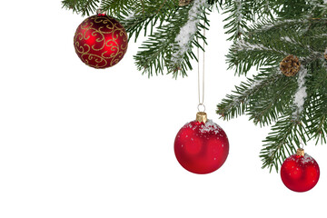 Christmas decorations with tree branches and baubles frame isolated on white background