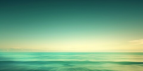Obraz premium A gradient background blending from deep teal to soft seafoam green, ideal for a tranquil and calming look