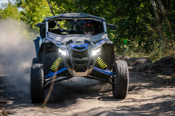 Cool view on UTV, 4x4 off-road vehicle in summer. Amateur competitions