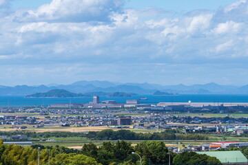 Landscape of factory area, residential area and seto inland sea in saijo city , ehime, shikoku, japan