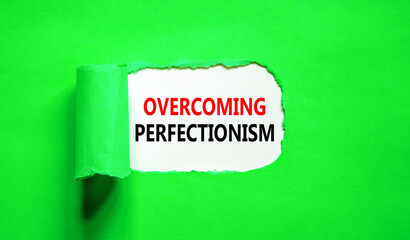 Overcoming perfectionism symbol. Concept words Overcoming perfectionism on beautiful white paper. Beautiful green paper background. Business Overcoming perfectionism concept. Copy space.