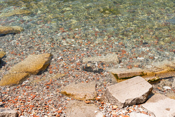 industrial construction waste dumped on a beach