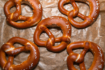 Baked pretzel on baking paper