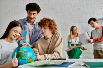 Teenagers participate in a Model UN conference, engaging in a lively discussion with a globe.